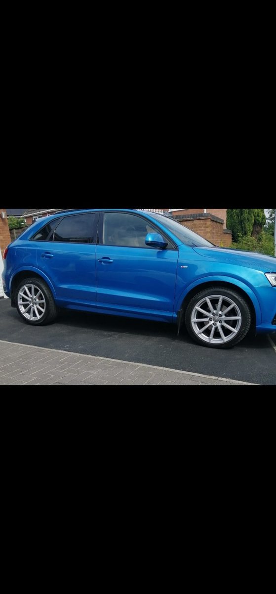 Blue Audi with refurbished silver alloy wheels