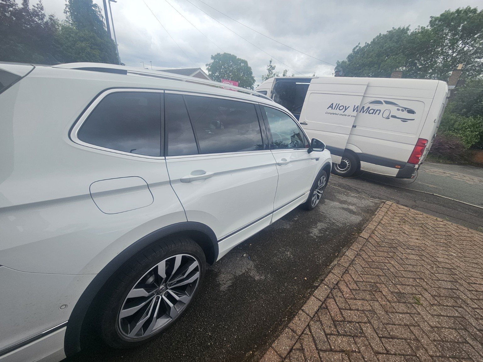 Mobile alloy wheel repair van at customer location